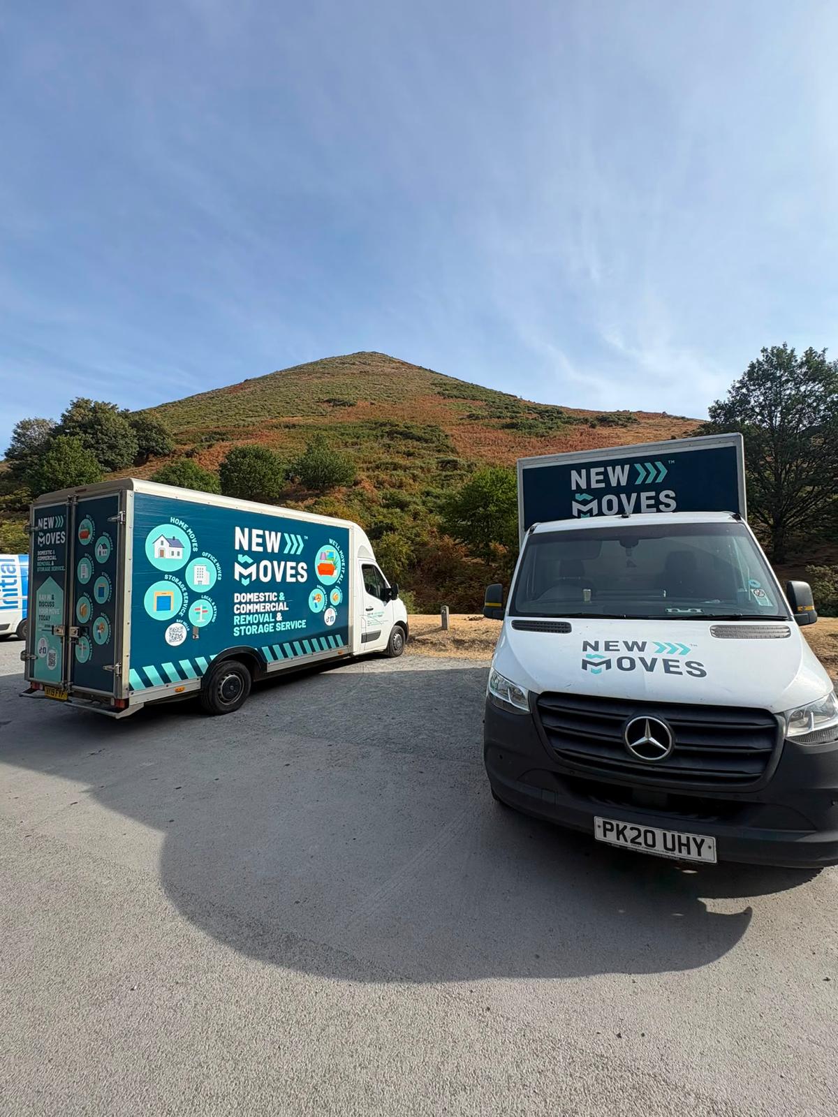 A New Moves Removals team member walking along a garden path